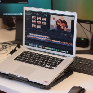 Soundance Laptop Cooling Pad vs. Raffle Drum: Unexpected Productivity Duo?